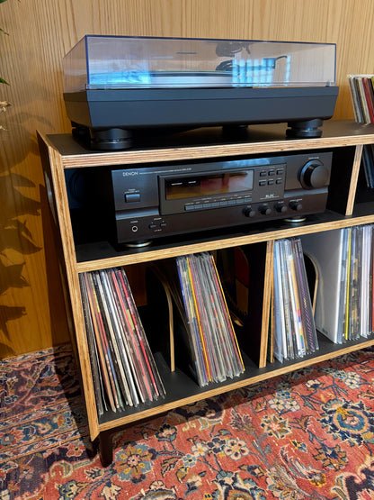 Turntable and Amplifier on Cabinet with Vinyl Collection
